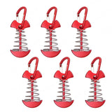 four red metal hooks with a red handle and a red handle