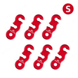 a set of red plastic eyelets with a white background