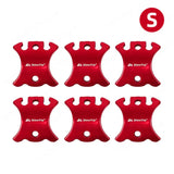 six red plastic bottle openers with six different sizes