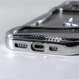 Shiny chrome phone case.