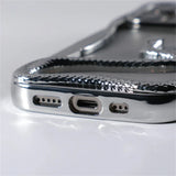 Shiny chrome phone case.