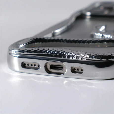 Shiny chrome phone case.