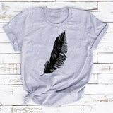 a grey t shirt with a black feather on it