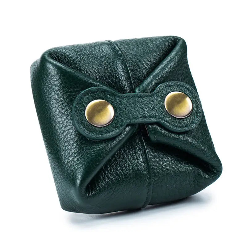 the green leather dice bag with gold eyes