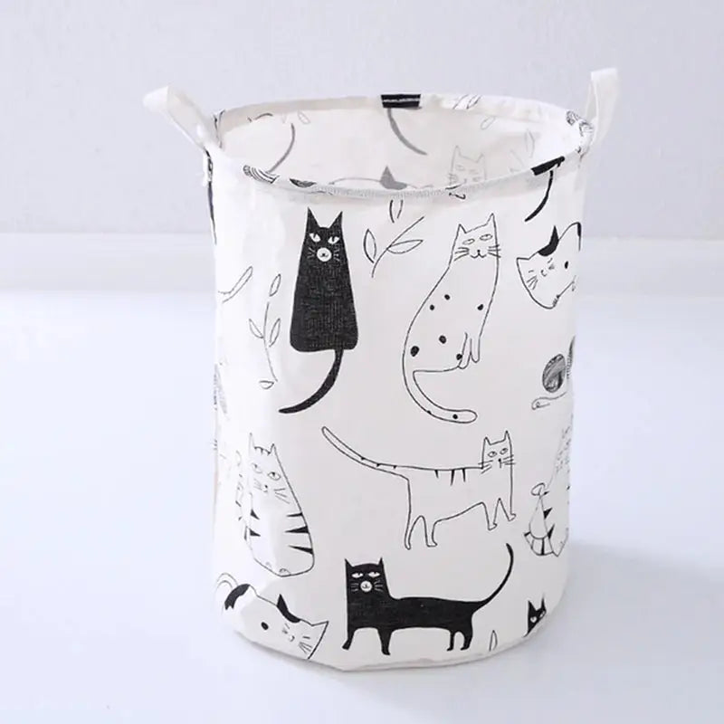 a white and black cat pattern laundry bag