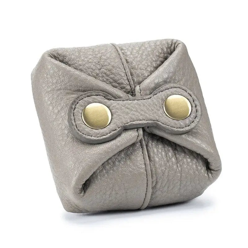 the grey leather dice bag with gold eyes