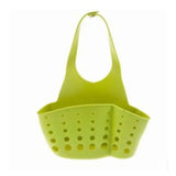 a green plastic basket with holes on it