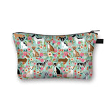 a small cosmetic bag with a pattern of foxes and flowers