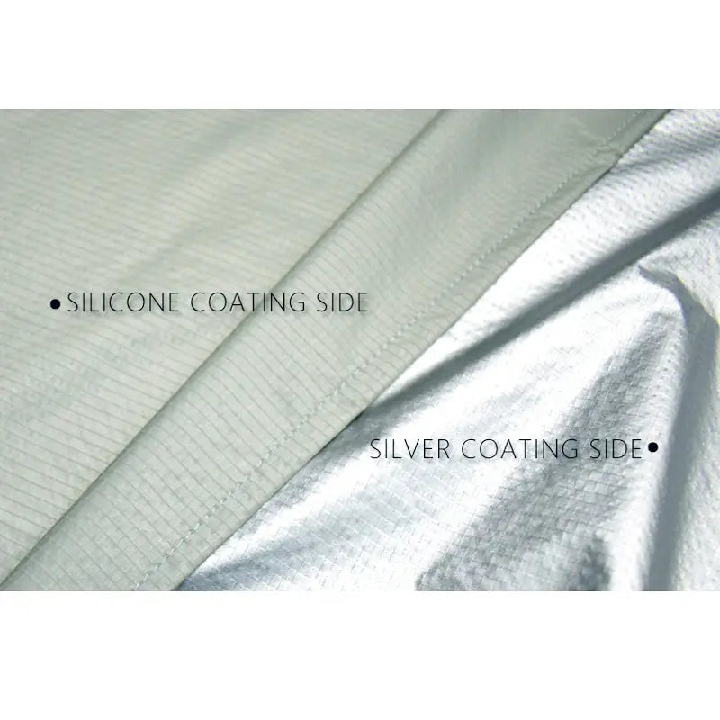 a silver satin fabric with a white background