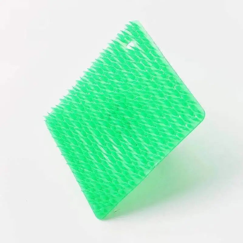 a green brush on a white background