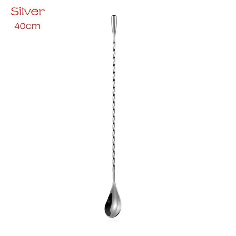 a close up of a spoon with a long handle on a white background