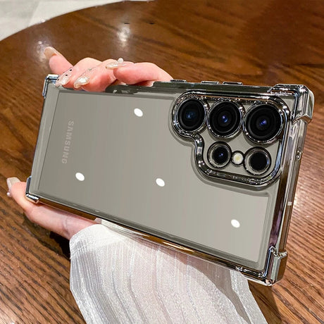 the back of a silver case with two lenses