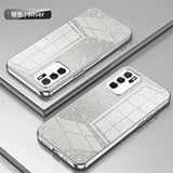 Silver glittery smartphone case with a triple camera setup.