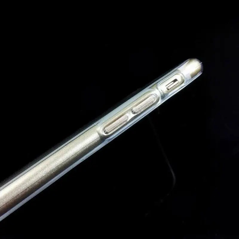 a silver pen with a black background