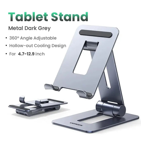 A silver metal stand with a phone and a tablet