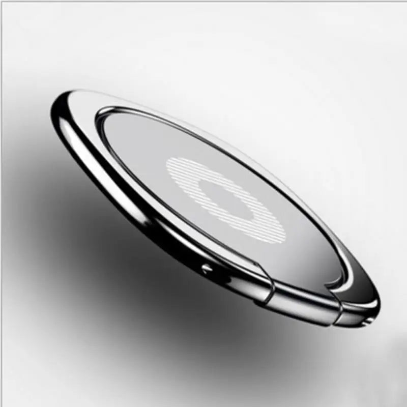 a silver object with a circular shape