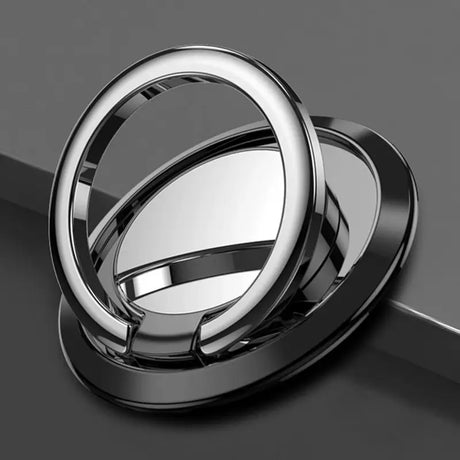 a silver ring with a black background