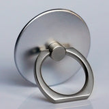 a silver ring with a circular design on it