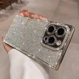 Glittering silver smartphone case with a jeweled camera bezel.