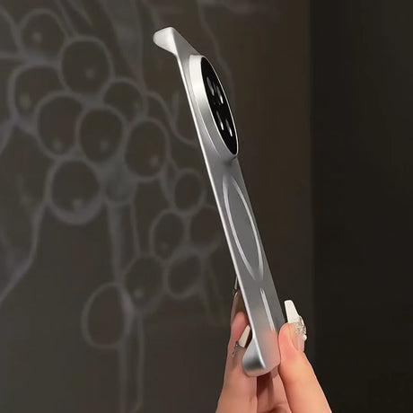 Silver smartphone with circular camera array.