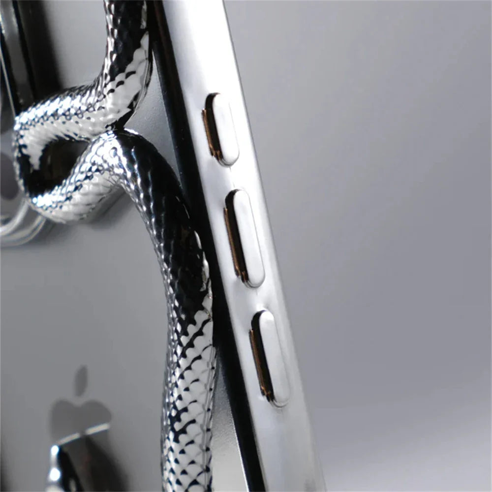 Silver smartphone with snake-patterned cord.