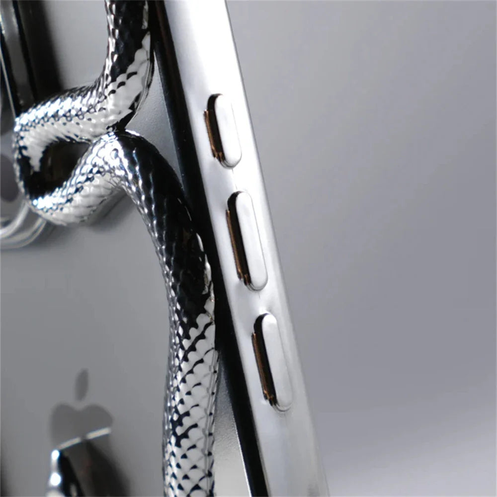 Silver smartphone with snake-patterned cord.