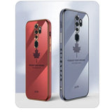 two red and silver smartphones with a maple leaf on the back