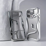Silver snake-themed phone cases.