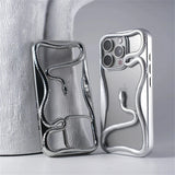 Silver snake-themed phone cases.