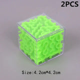 a green plastic cube with a white background