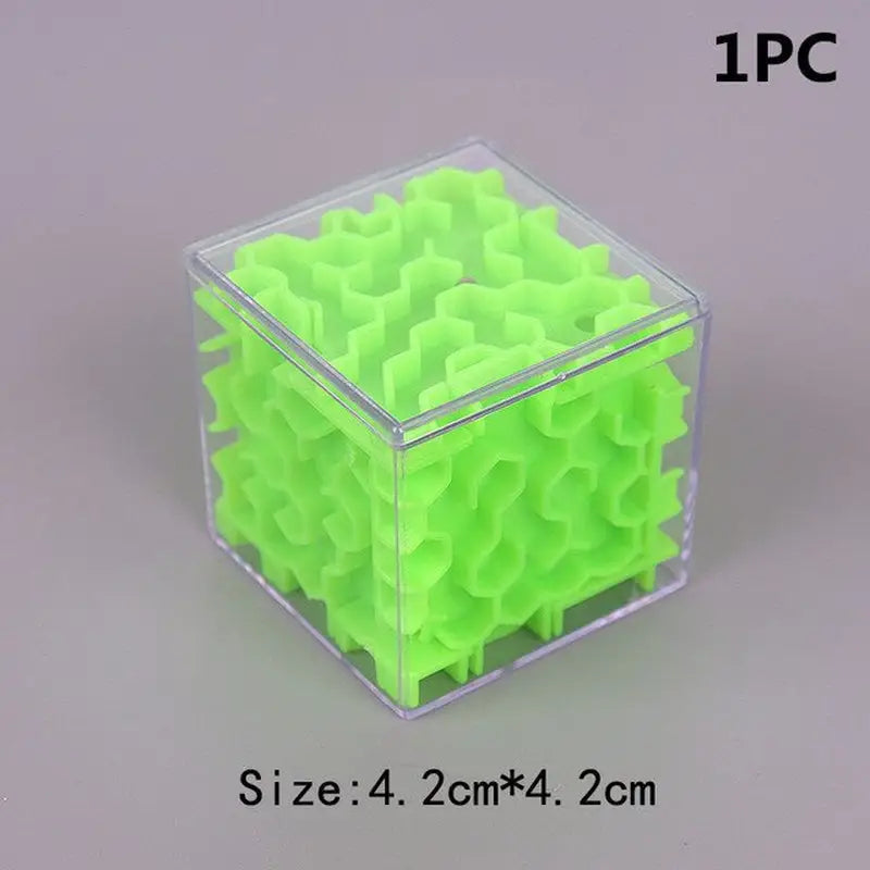 a small plastic cube with a green glow