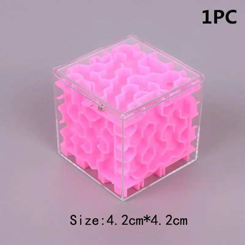 a pink cube shaped object with a white background