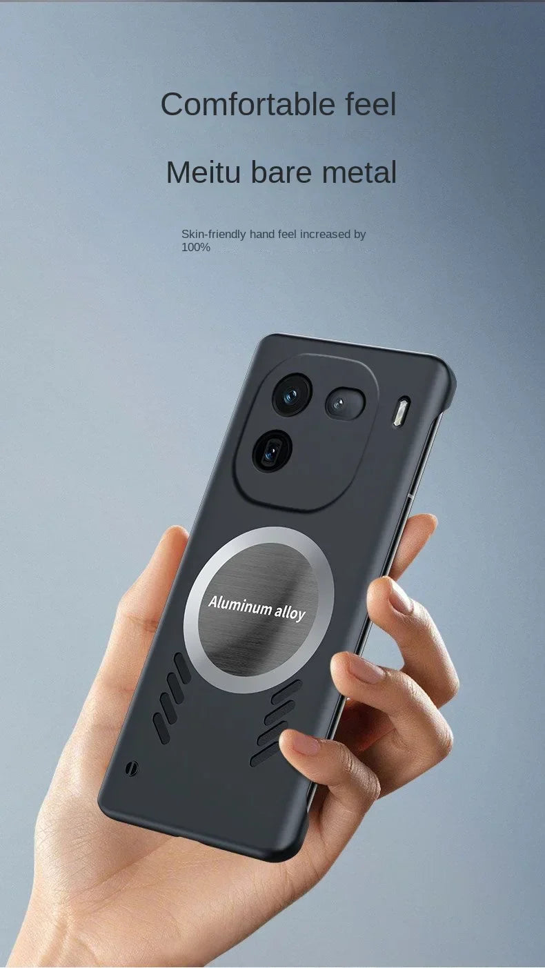 Sleek black smartphone with a circular design element and multiple camera lenses held in a hand.