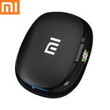 Sleek black Xiaomi Mi device with a rounded rectangular shape and small display.