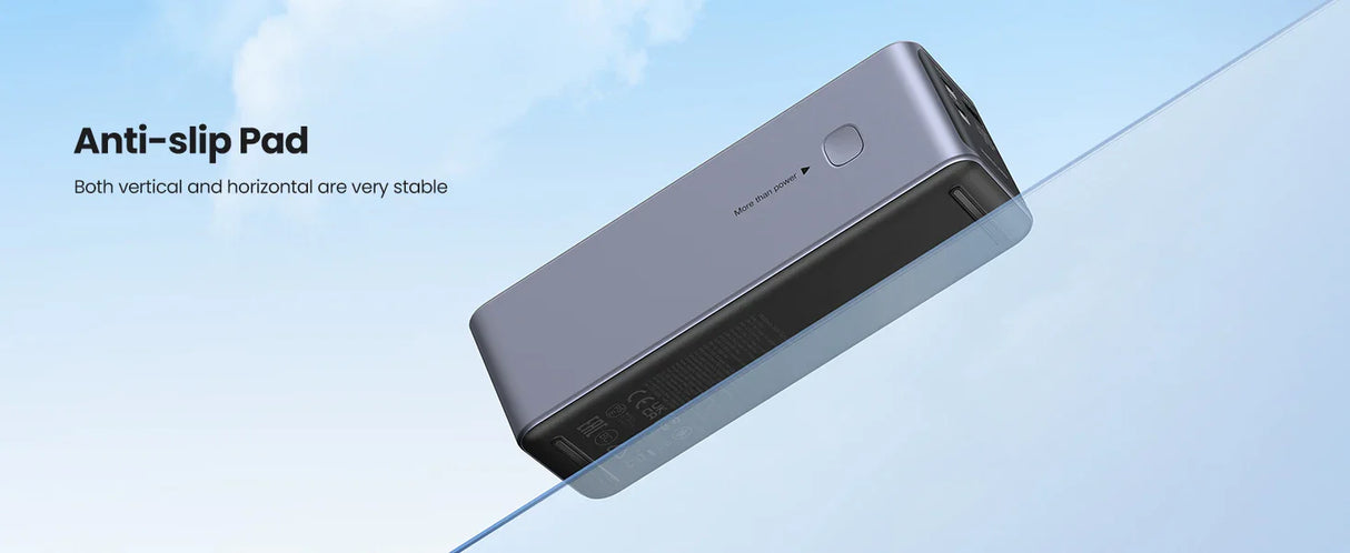 Sleek gray rectangular power bank with an anti-slip pad.