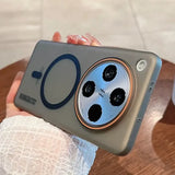 A sleek, grey smartphone in a protective case with a prominent circular camera module and a magnetic charging ring.
