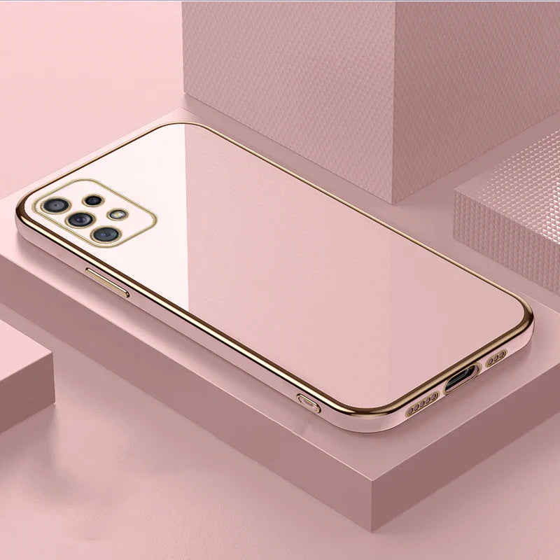 Sleek pink smartphone with a gold-trimmed frame and multiple camera lenses.