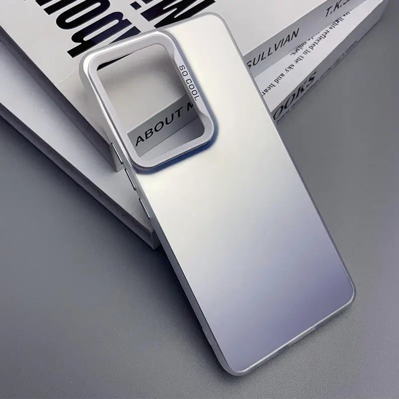 Sleek silver smartphone case with a square camera cutout displaying ’ABOUT’ text.