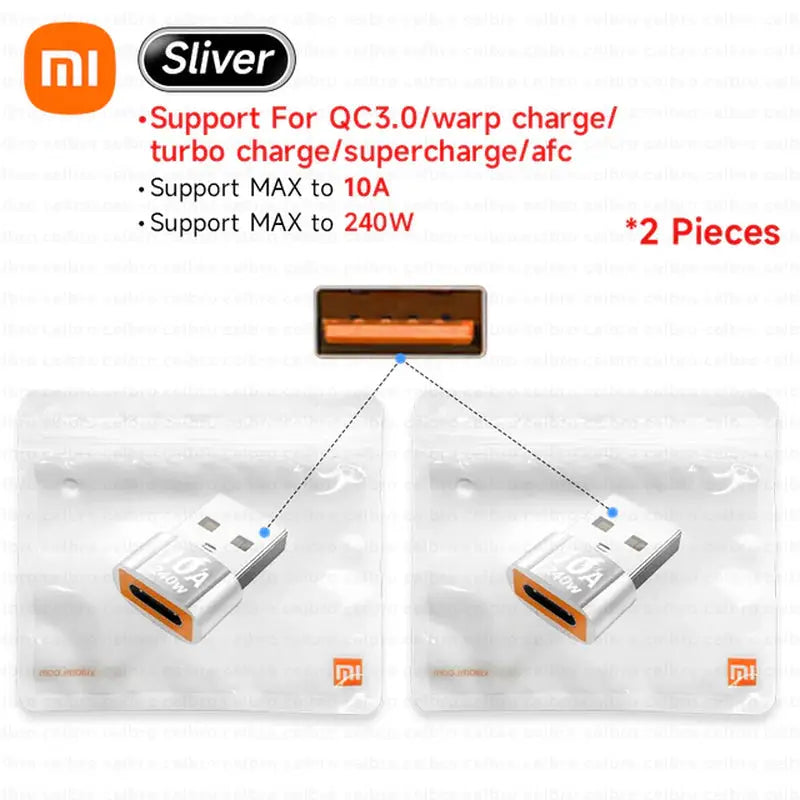 two pieces of silver and orange charger attached to a white wall