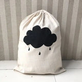 a bag with a black clover on it