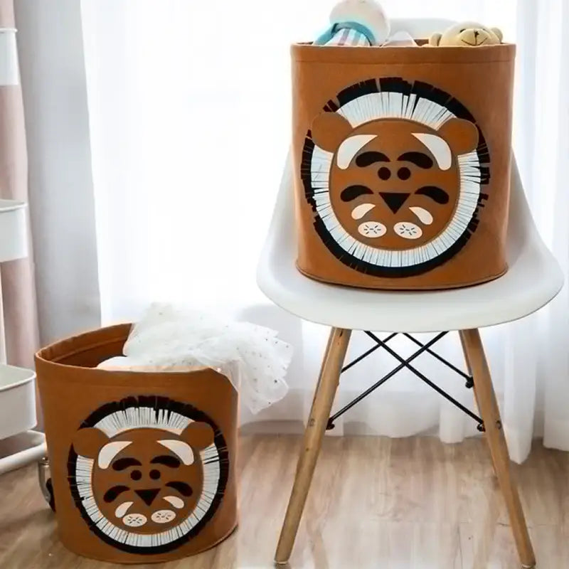 a small child’s room with a lion basket and a toy