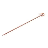 a small copper colored metal pin with a long handle