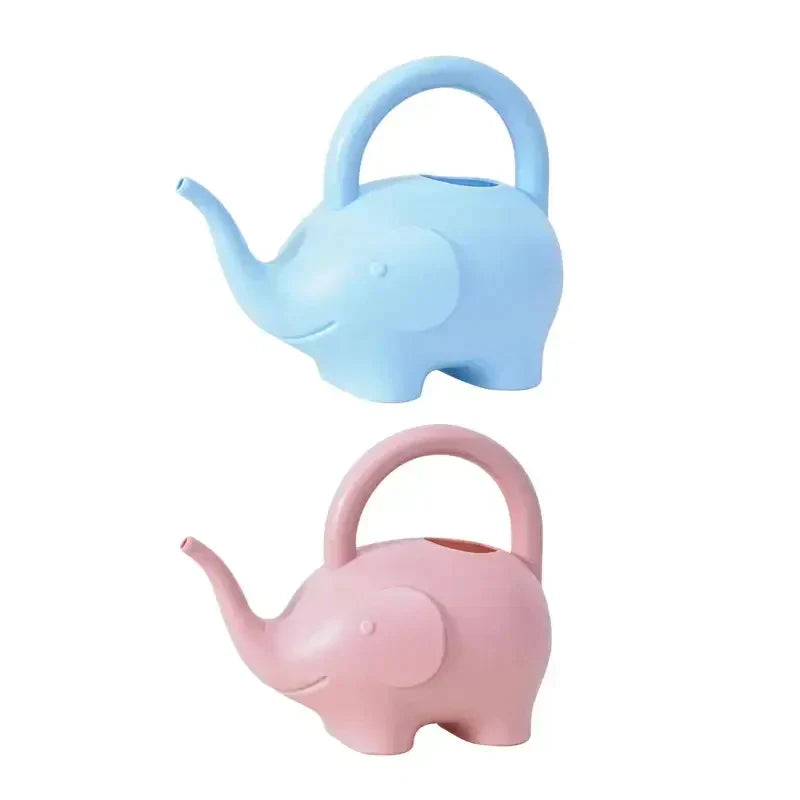 a small elephant shaped teapot with a handle