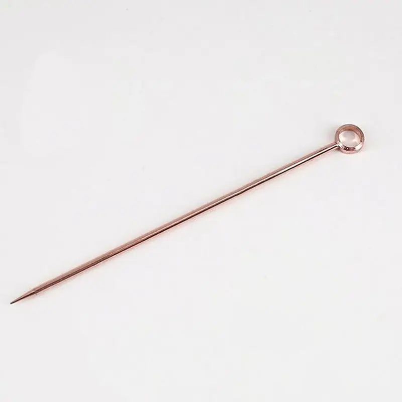 a metal pin with a long handle