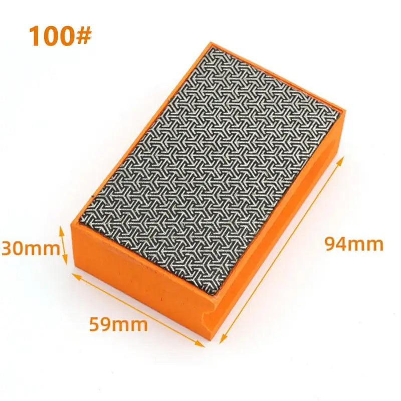 a small orange box with a pattern on it