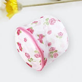 a small pink rose print cosmetic bag