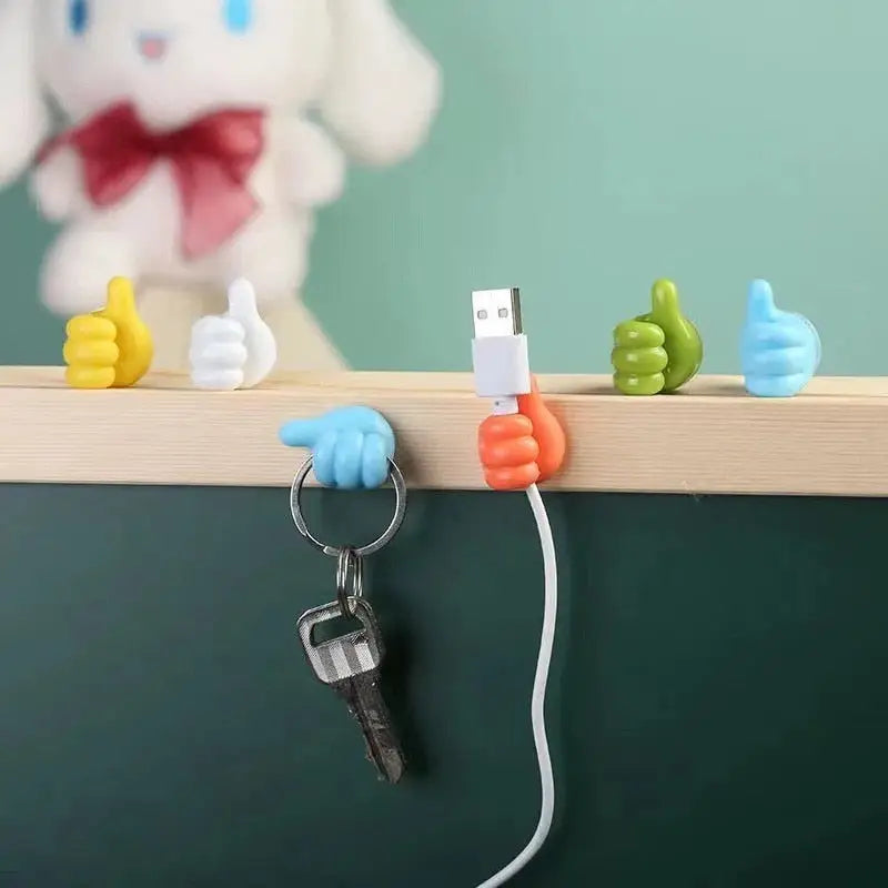 a small toy is sitting on a blackboard