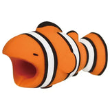 a small toy clown fish with a black and white stripe