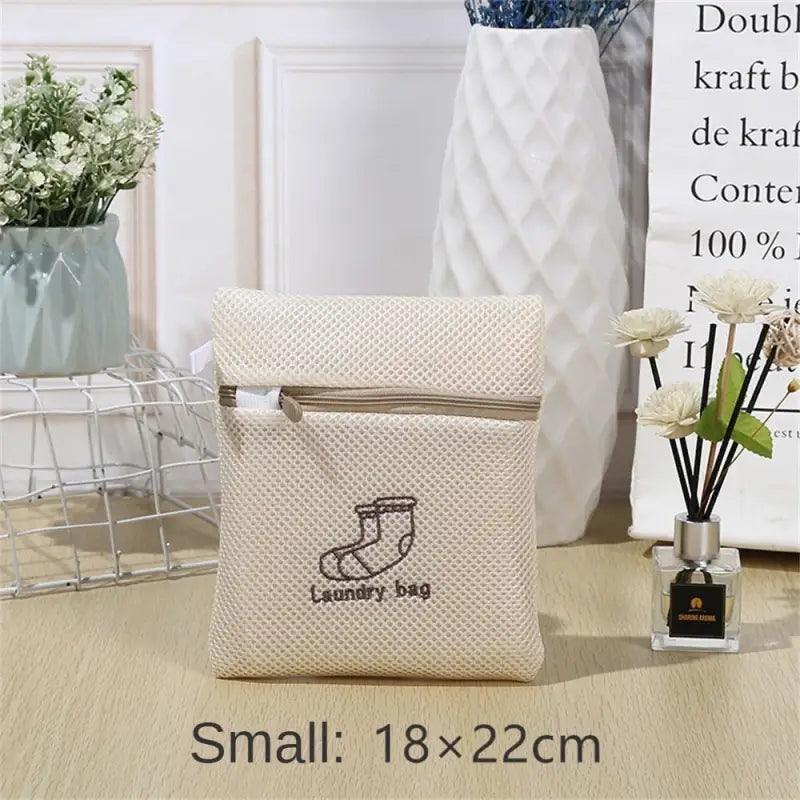 a small bag with a small flower in it