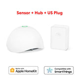 the smart home security device with a white cover and a green button